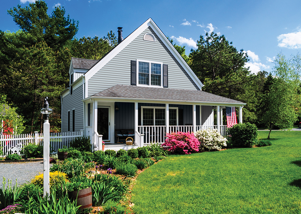 Exterior Portfolio Elm Grove Dutch lap siding on a white-porch farmhouse