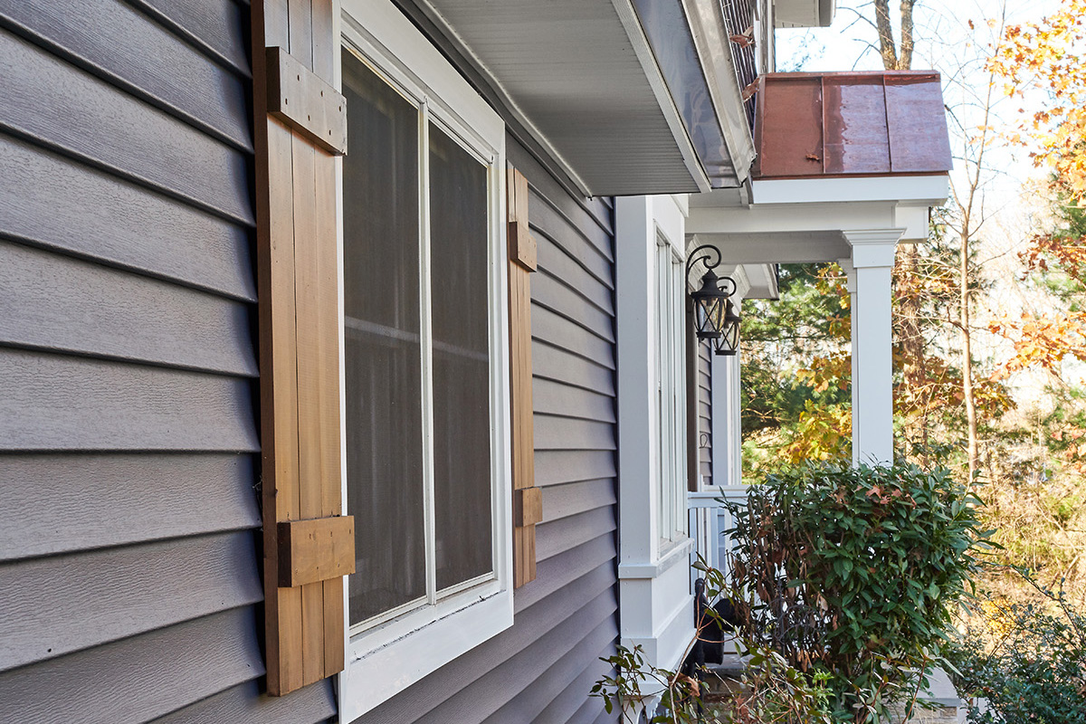 Exterior Portfolio Board & Batten vertical siding in Oceanside on a two-story home gable